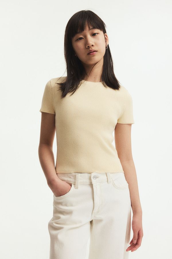 Blusa corta en tejido acanalado