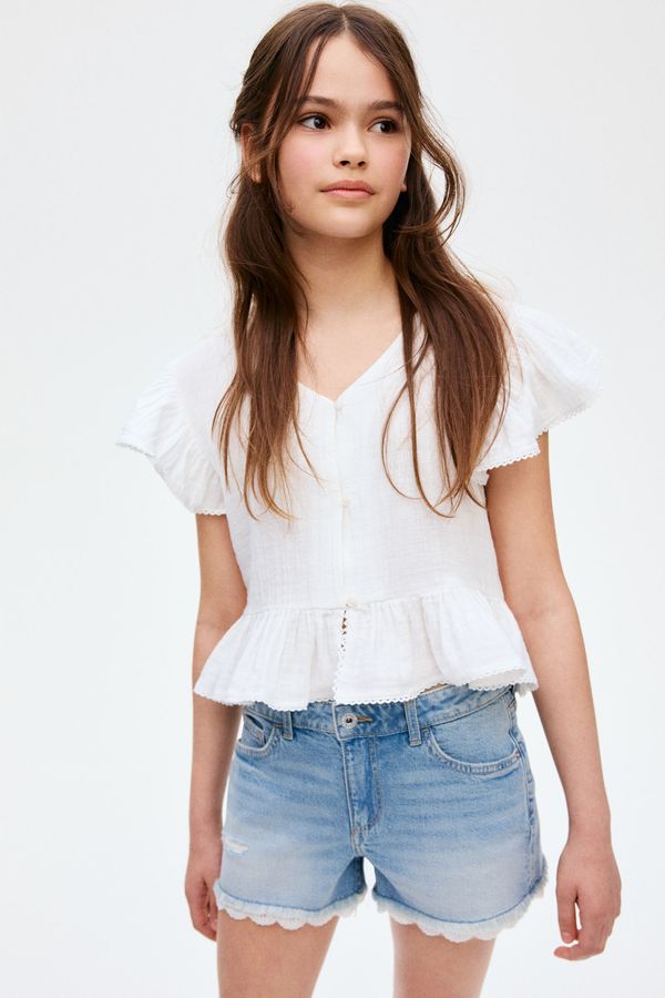Shorts en denim de algodón