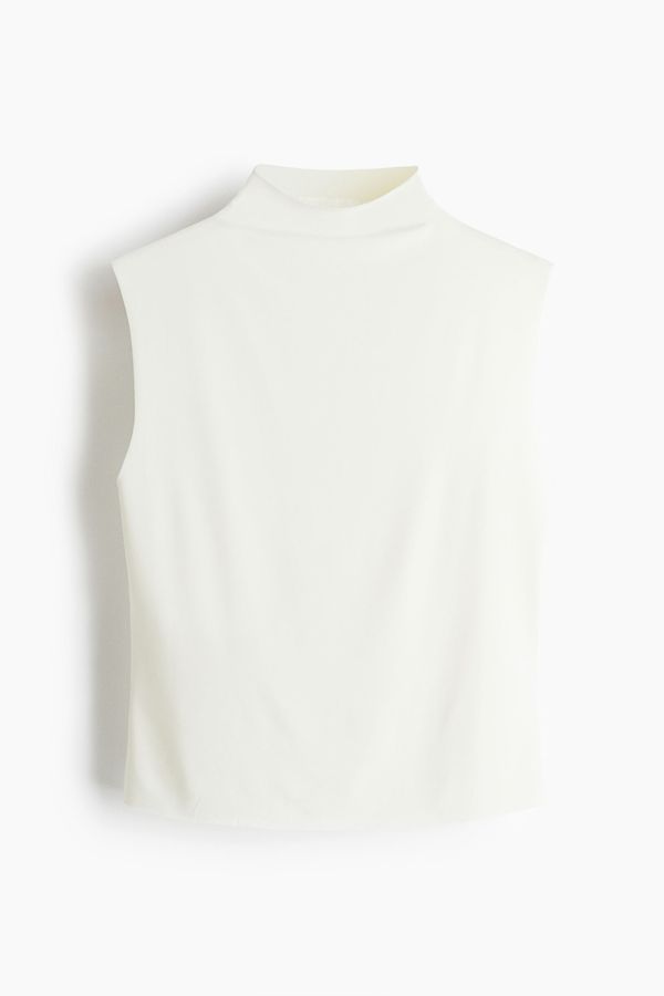 Blusa manga sisa con cuello alto