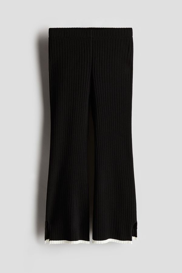 Pantalón bota campana en tejido acanalado