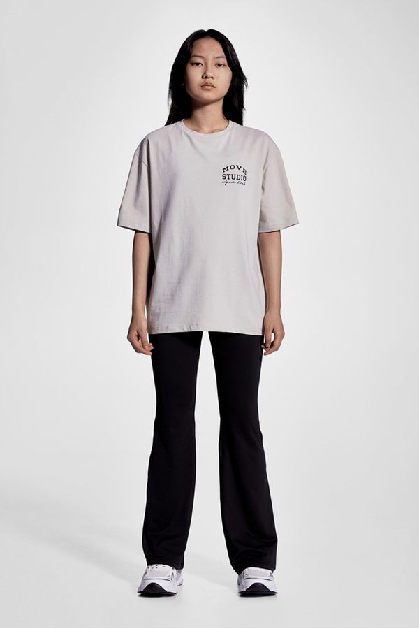 Leggings de deporte acampanados con DryMove™