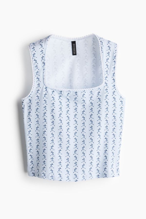 Camiseta manga sisa con ribete de picot