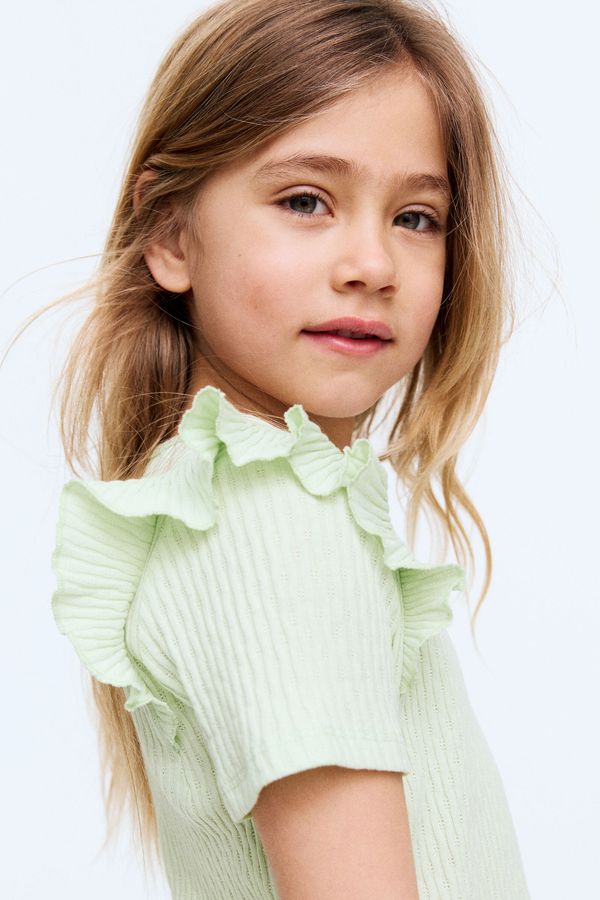 Blusa en algodón con volantes