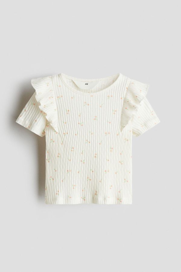 Blusa en algodón con volantes