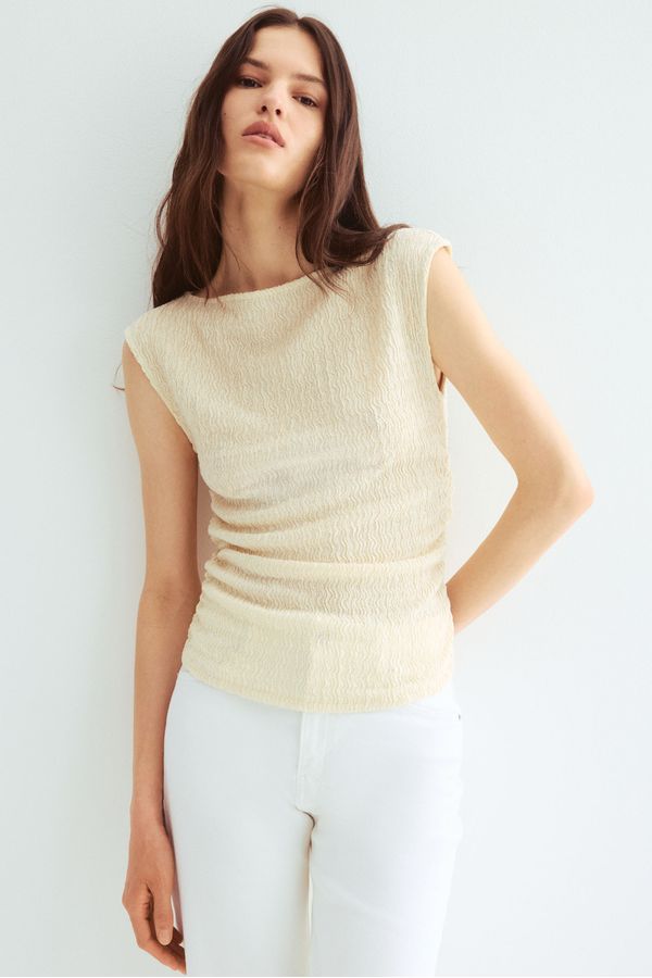 Blusa en punto con textura