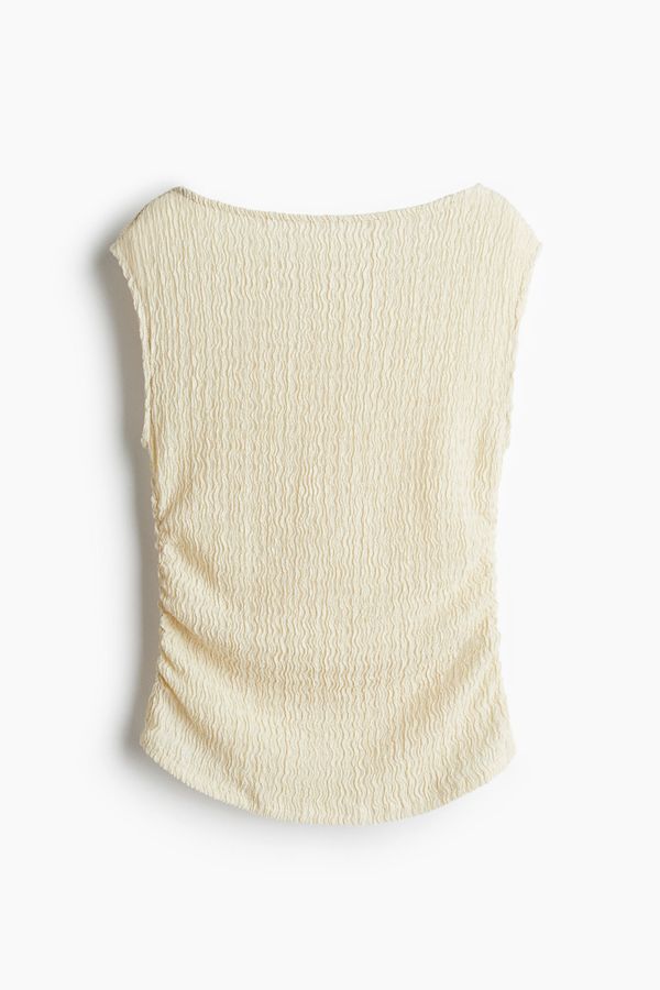 Blusa en punto con textura
