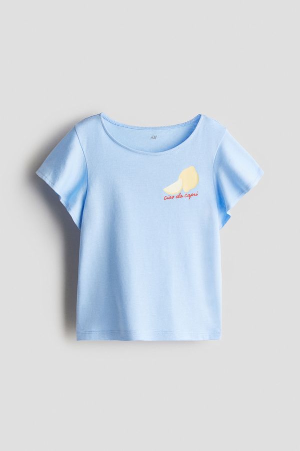 Camiseta en algodón con manga de volante