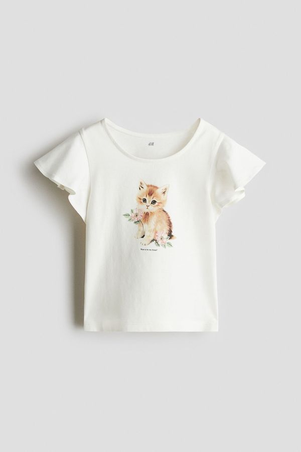 Camiseta en algodón con manga de volante