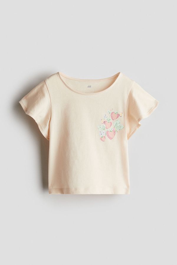 Camiseta en algodón con manga de volante