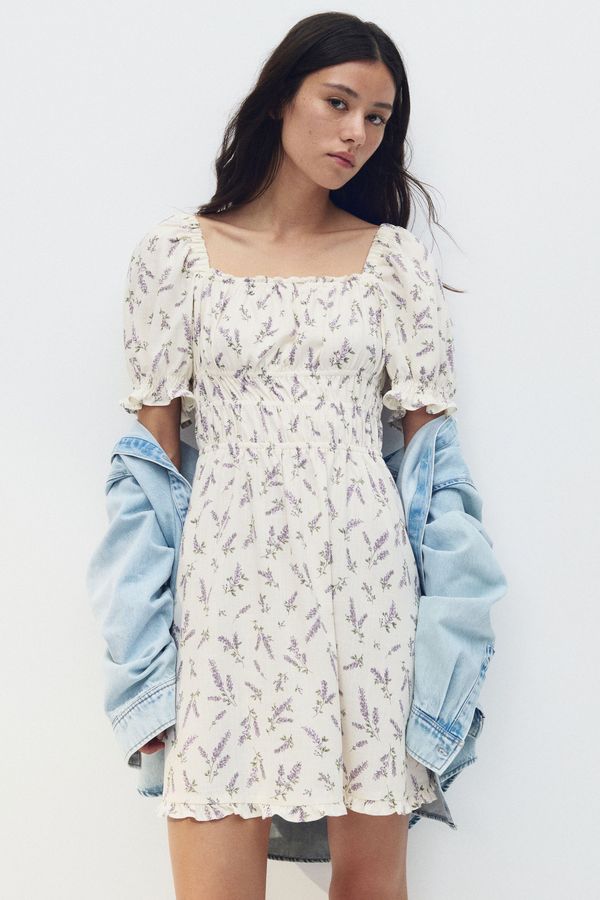 Vestido con detalle enresortado