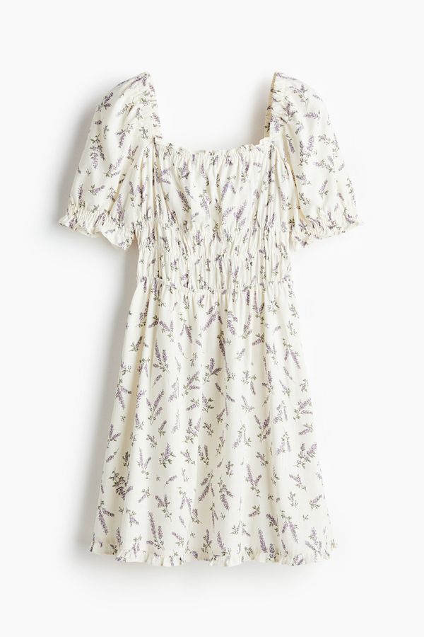 Vestido con detalle enresortado