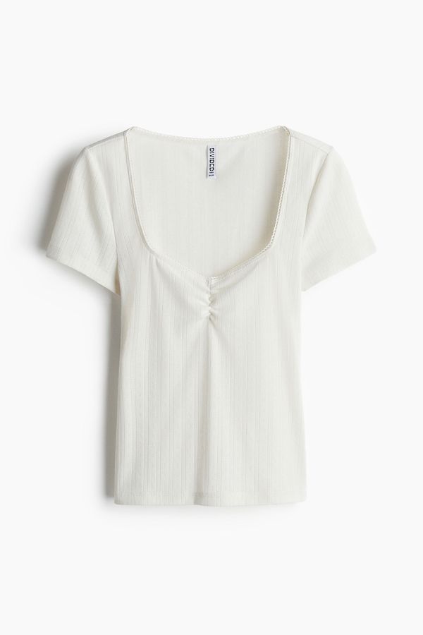 Camiseta con ribetes de picot