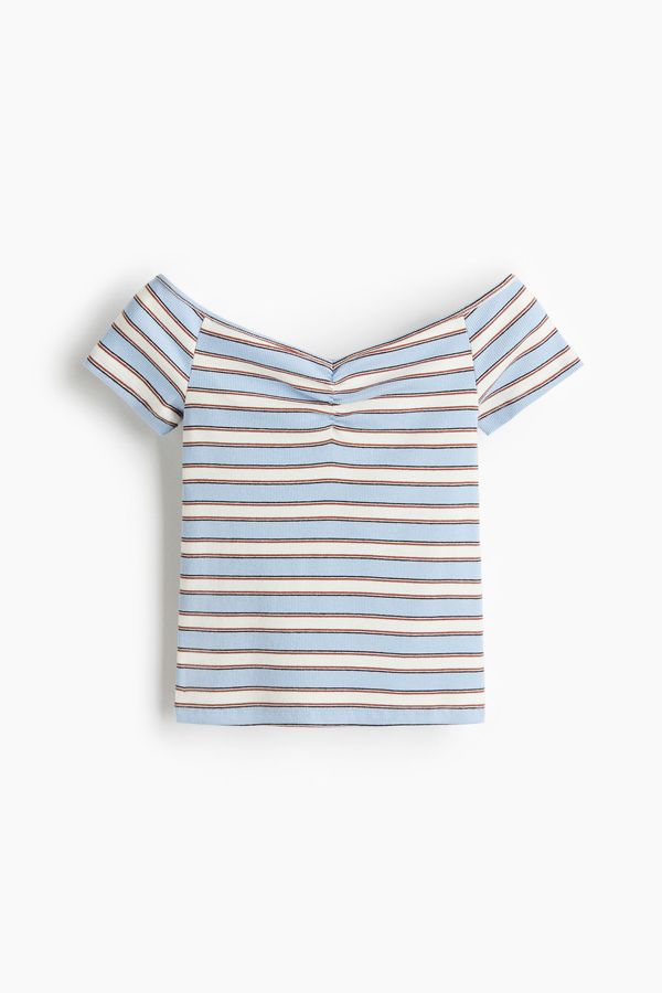 Blusa en punto acanalado con escote barco