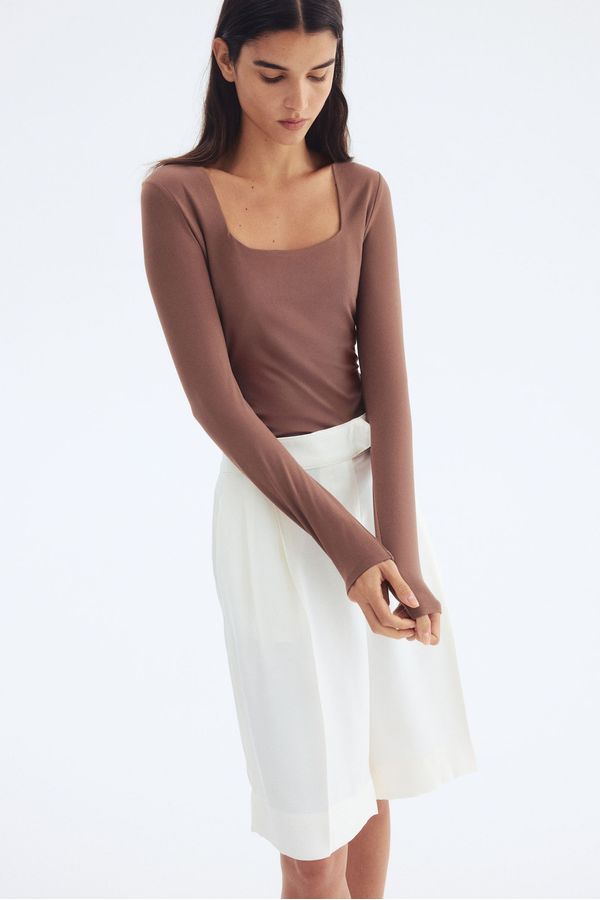 Blusa de mangas largas