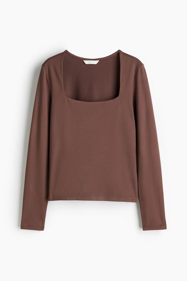 Blusa de mangas largas