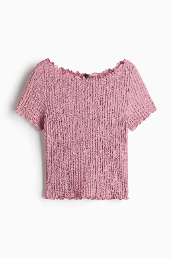Blusa efecto arrugado con detalles fileteados