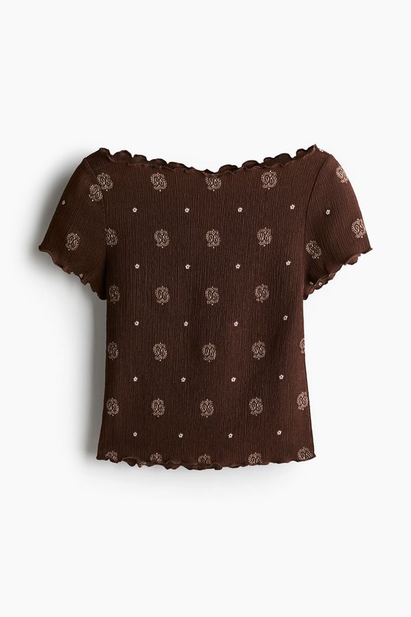 Blusa efecto arrugado con detalles fileteados