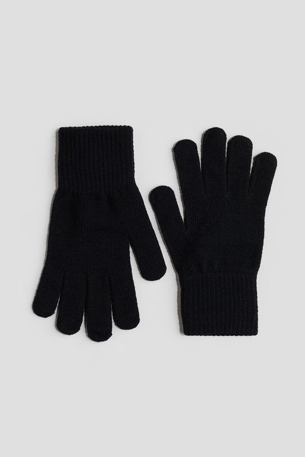 Guantes en tejido fino