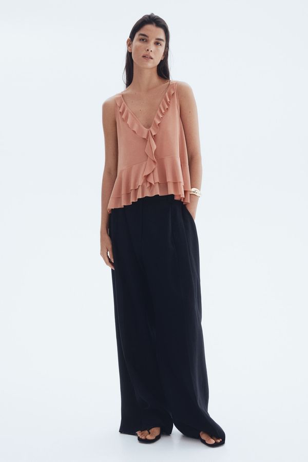 Blusa de tiras con volantes decorativos