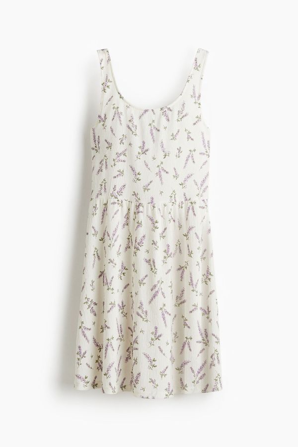 Vestido en punto con efecto arrugado