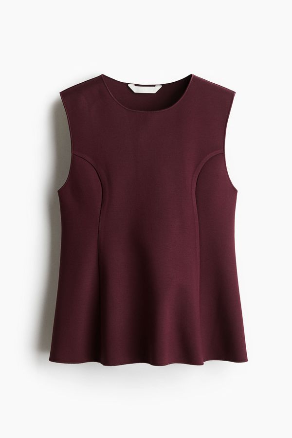 Blusa interlock con peplum