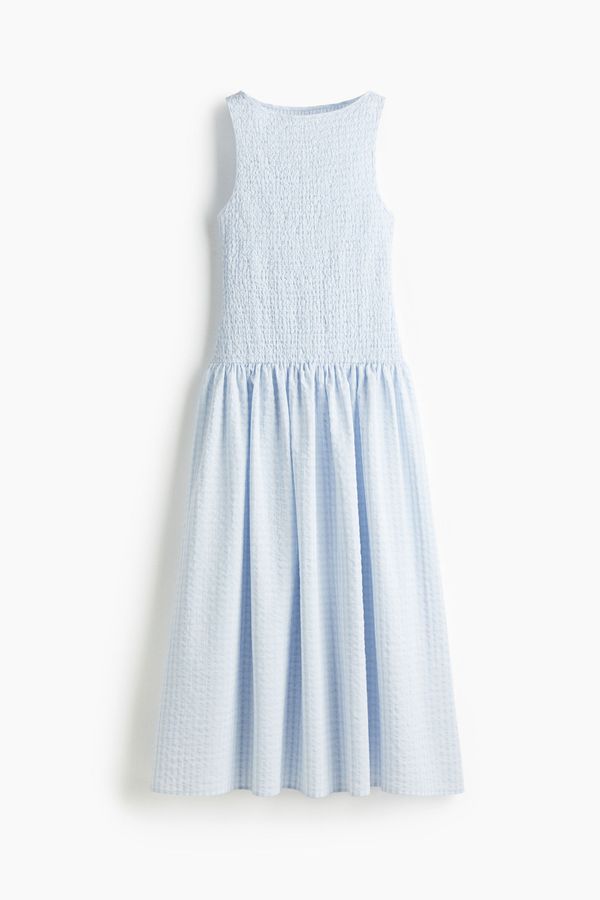 Vestido en sirsaca con enresortado