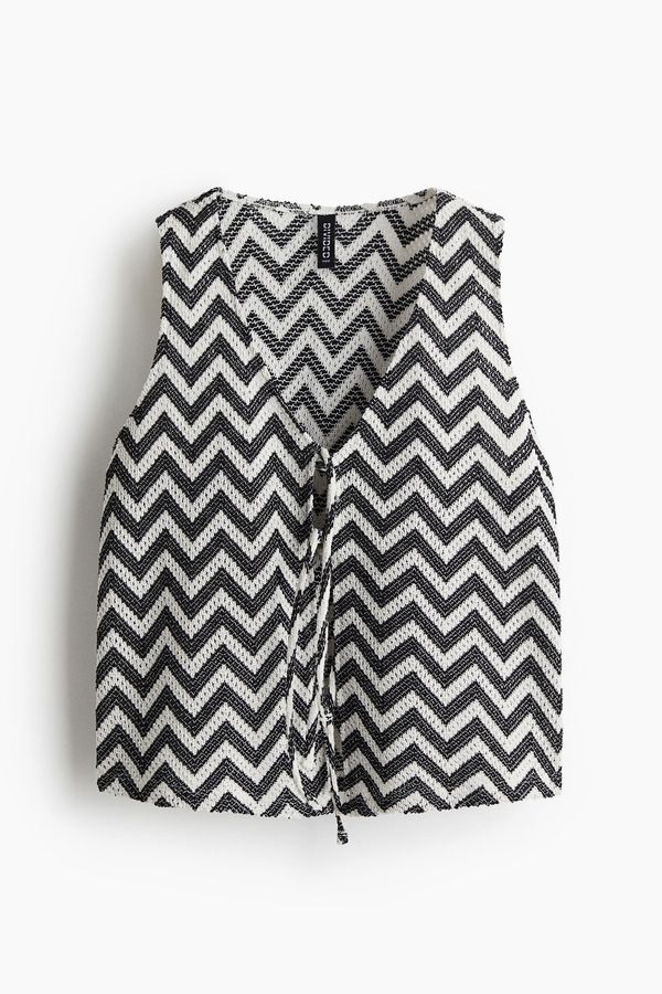 Chaleco en tejido jacquard con tiras de anudar