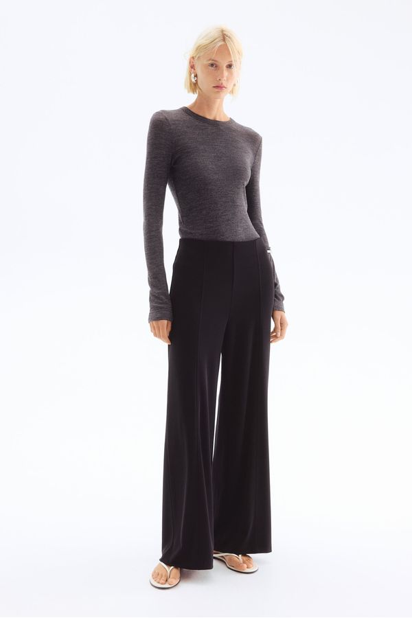 Pantalón ancho
