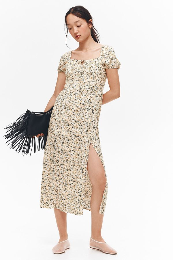 Vestido con mangas globo