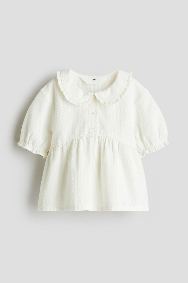 Blusa con peplum