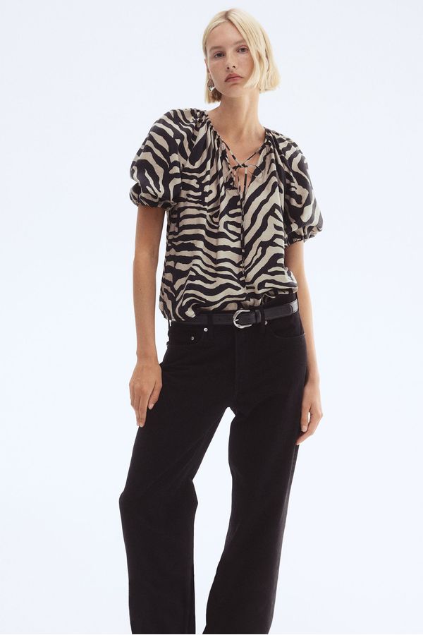 Blusa con mangas globo