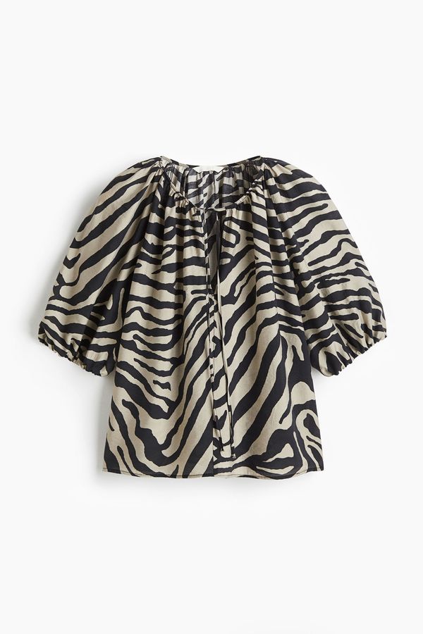 Blusa con mangas globo