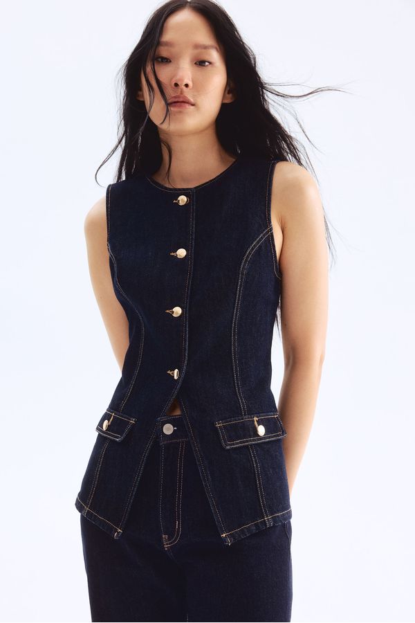 Chaleco en denim entallado