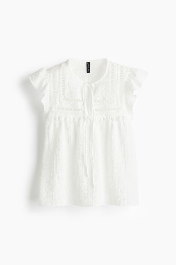 Blusa en punto texturizado