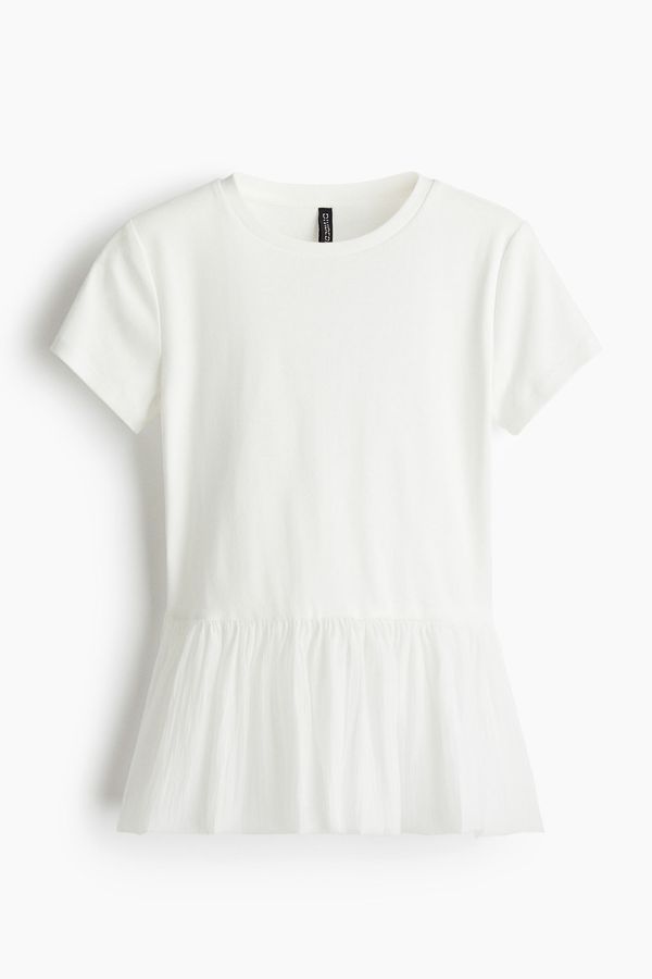 Blusa con bajo estilo globo