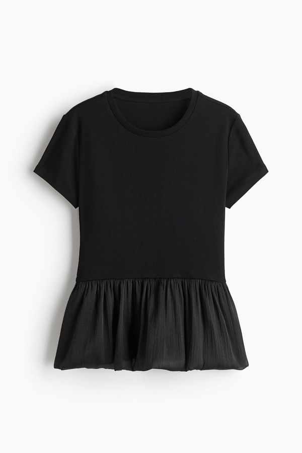 Blusa con bajo estilo globo