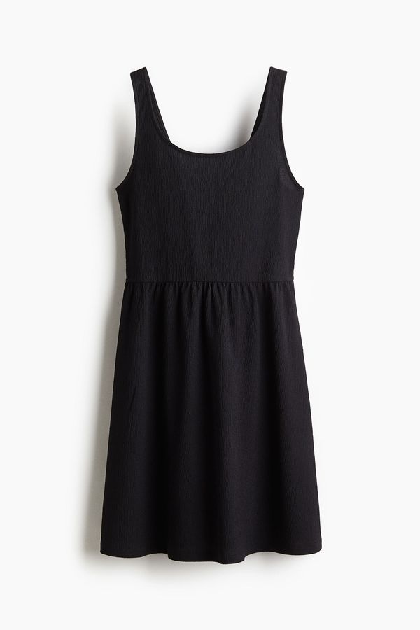 Vestido en punto con efecto arrugado